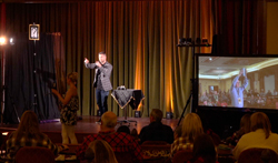 Aaron Paterson captivates Insurance Store employees on their recent retreat.